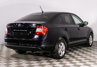 Подержанный автомобиль Skoda Rapid Liftback 2014 года (3 фото)