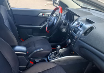 Подержанный автомобиль Kia Cerato Sedan 2012 года (11 фото)