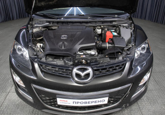 Подержанный автомобиль Mazda CX-7 2011 года (18 фото)