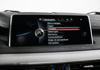 Подержанный автомобиль BMW X6 2016 года (15 фото)