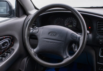 Подержанный автомобиль Kia Spectra Sedan 2006 года (15 фото)