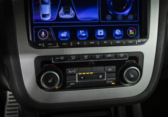 Подержанный автомобиль Volkswagen Scirocco 2011 года (13 фото)