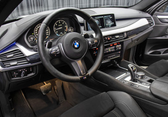 Подержанный автомобиль BMW X6 2017 года (16 фото)