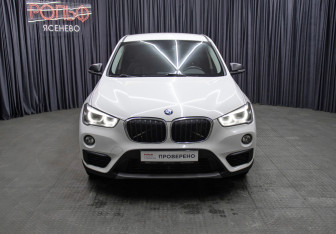 Подержанный автомобиль BMW X1 2015 года (2 фото)