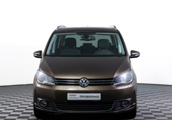 Подержанный автомобиль Volkswagen Touran 2013 года (2 фото)