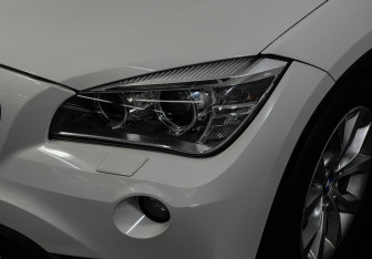 Подержанный автомобиль BMW X1 2013 года (7 фото)