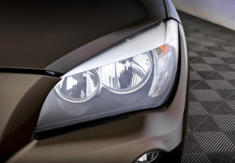 Подержанный автомобиль BMW X1 2012 года (17 фото)