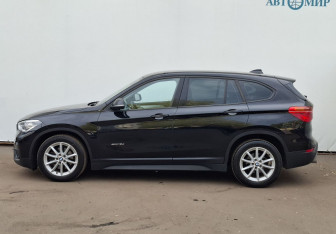 Подержанный автомобиль BMW X1 2015 года (8 фото)