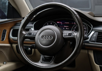 Подержанный автомобиль Audi A7 2016 года (34 фото)