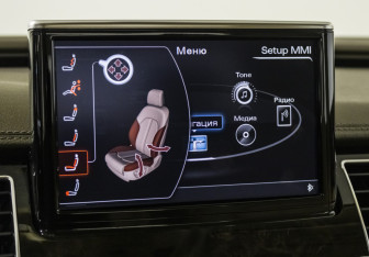 Подержанный автомобиль Audi A8 2014 года (18 фото)
