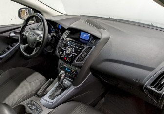 Подержанный автомобиль Ford Focus Wagon 2014 года (19 фото)