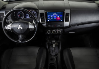 Подержанный автомобиль Mitsubishi Outlander 2010 года (11 фото)