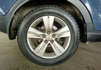 Подержанный автомобиль Kia Sportage 2011 года (19 фото)
