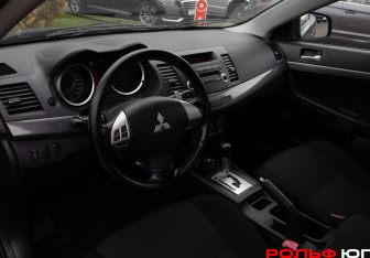 Подержанный автомобиль Mitsubishi Lancer Hatchback 2008 года (10 фото)