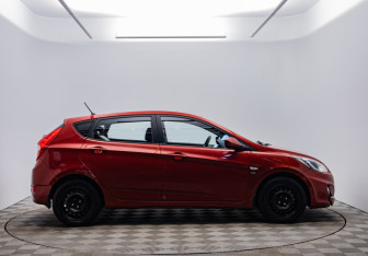 Подержанный автомобиль Hyundai Solaris Hatchback 2013 года (6 фото)