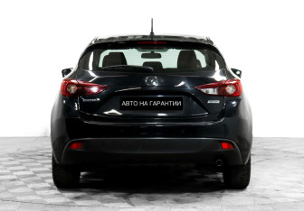 Подержанный автомобиль Mazda 3 Hatchback 2014 года (6 фото)