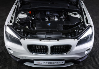 Подержанный автомобиль BMW X1 2014 года (9 фото)