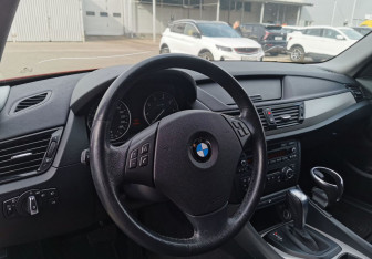 Подержанный автомобиль BMW X1 2014 года (9 фото)