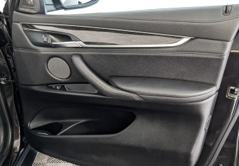 Подержанный автомобиль BMW X6 2016 года (25 фото)