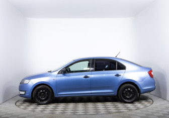 Подержанный автомобиль Skoda Rapid Liftback 2014 года (8 фото)