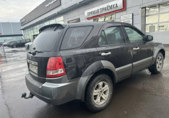 Подержанный автомобиль Kia Sorento 2002 года (13 фото)