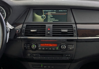 Подержанный автомобиль BMW X6 2013 года (15 фото)