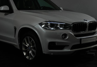 Подержанный автомобиль BMW X5 2016 года (21 фото)