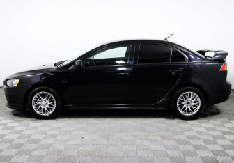 Подержанный автомобиль Mitsubishi Lancer Sedan 2013 года (3 фото)