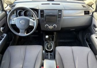 Подержанный автомобиль Nissan Tiida Sedan 2010 года (10 фото)