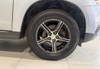 Подержанный автомобиль Mitsubishi ASX 2011 года (18 фото)