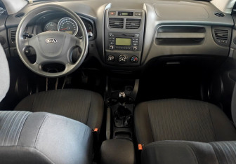Подержанный автомобиль Kia Sportage 2010 года (11 фото)