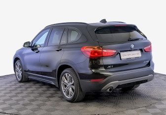 Подержанный автомобиль BMW X1 2018 года (7 фото)
