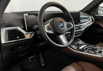 Подержанный автомобиль BMW X5 2025 года (12 фото)