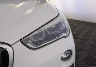 Подержанный автомобиль BMW X1 2018 года (11 фото)