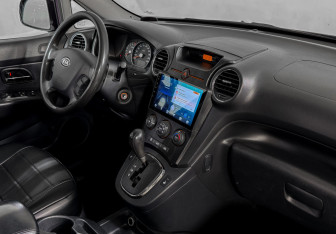 Подержанный автомобиль Kia Carens 2011 года (10 фото)