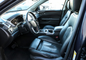 Подержанный автомобиль Cadillac SRX 2014 года (15 фото)