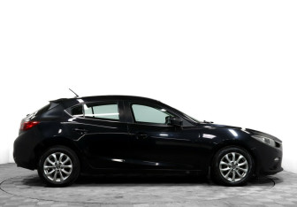 Подержанный автомобиль Mazda 3 Hatchback 2014 года (4 фото)