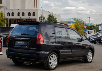 Подержанный автомобиль Mitsubishi Space Star Compactvan 2004 года (4 фото)