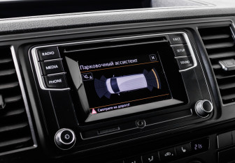 Подержанный автомобиль Volkswagen Caravelle 2016 года (13 фото)