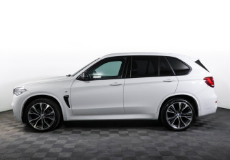Подержанный автомобиль BMW X5 2014 года (8 фото)