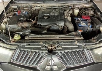 Подержанный автомобиль Mitsubishi L200 2008 года (15 фото)
