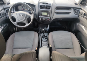 Подержанный автомобиль Kia Sportage 2010 года (10 фото)