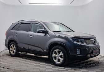 Подержанный автомобиль Kia Sorento 2015 года (7 фото)