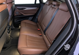 Подержанный автомобиль BMW X6 2018 года (18 фото)