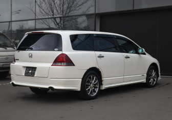 Подержанный автомобиль Honda Odyssey Compactvan 2004 года (5 фото)