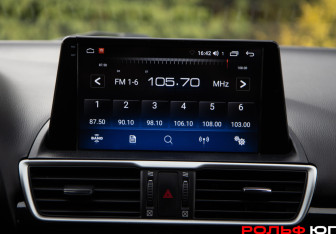 Подержанный автомобиль Mazda 3 Hatchback 2015 года (13 фото)