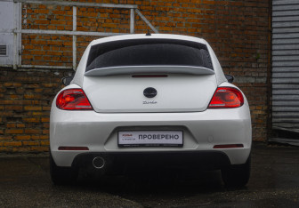 Подержанный автомобиль Volkswagen Beetle Hatchback 2013 года (8 фото)