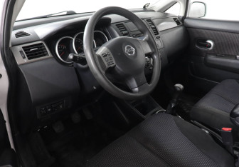 Подержанный автомобиль Nissan Tiida Sedan 2013 года (9 фото)