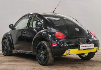 Подержанный автомобиль Volkswagen Beetle Hatchback 1999 года (8 фото)