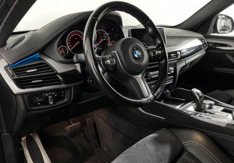 Подержанный автомобиль BMW X6 2018 года (12 фото)
